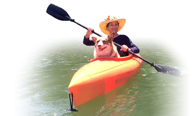 Elin Elisofon kayaking with her dog